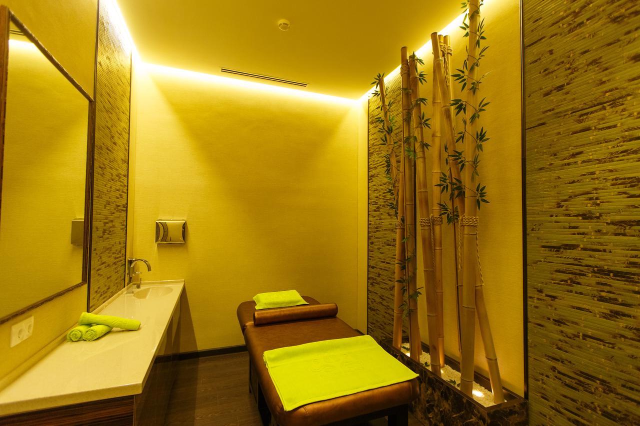 Sultan Palace Hotel Atyraū Esterno foto A treatment room at a spa